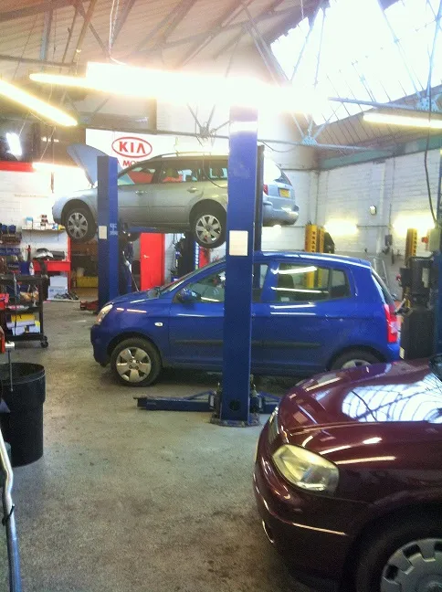 Cars on the lifts in the RD Motors workshop
